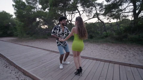 Medium shot of a couple of dancers doing turns Stock-Footage 257585372