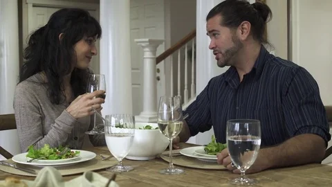 Medium shot of a couple having a meal at home Stock-Footage 73249074