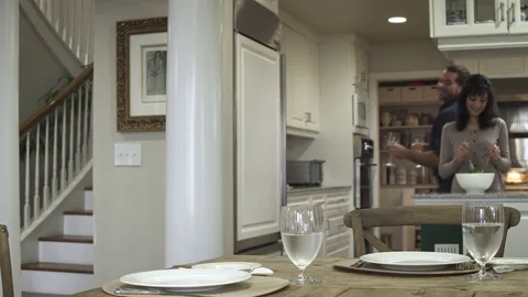 Medium shot of a couple having a meal at home Stock Footage 73253064