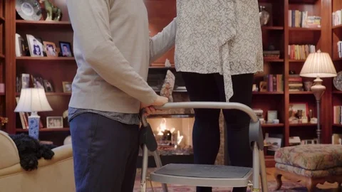 Medium shot of a couple hugging under a mistletoe 動画素材 73107843