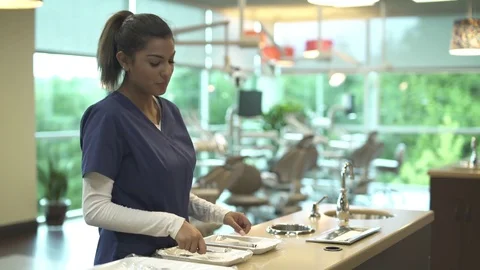 Medium shot of a dental assistant at work Stock-Footage 76216822