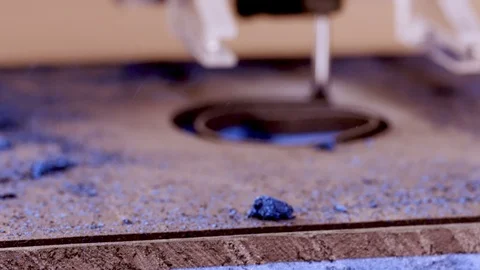 Medium Shot of Drill Bit Cutting out Foam Stock Footage 87463857