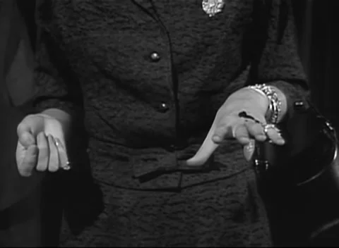 Medium shot of drops of blood falling on woman's hand, 1950s Stock Footage 260258799