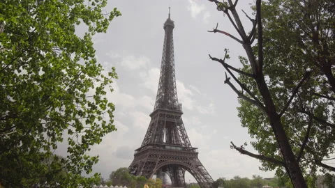 Medium Shot Of The Eiffel Tower In Paris, France View with Trees in the Stock Footage 205857380