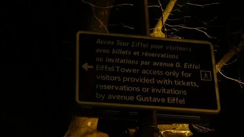 Medium shot of Eiffel Tower Sign at night Stock Footage 97152245