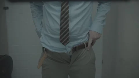 Medium shot of employee using public restroom  Stock Footage 136333937