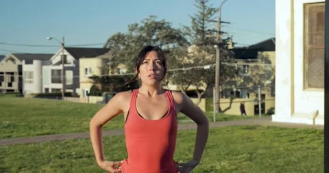Medium shot of Eurasian female as she prepares to do a chip up Stock Footage 138253687