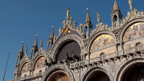 Medium shot of the facacde of Saint Marks Basilica, St Mark's Square, Venice  Stock Footage 83367460