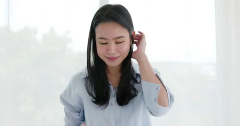 Medium shot face of a beautiful Asian woman with a happy smile. facial skin Stock Footage 197640940