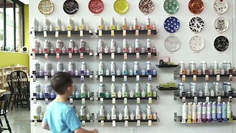 Medium shot of a family in a ceramic studio 스톡 동영상 73290534