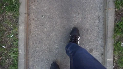 Medium shot of feet walking man. First-Person mod Stock Footage 75814968