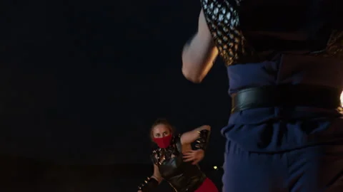 Medium shot of five fierce fire artists of mixed-gender performing together Stock Footage 144748976