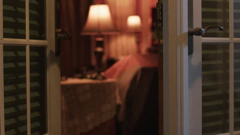 Medium shot of front door opening Stock Footage 244644990