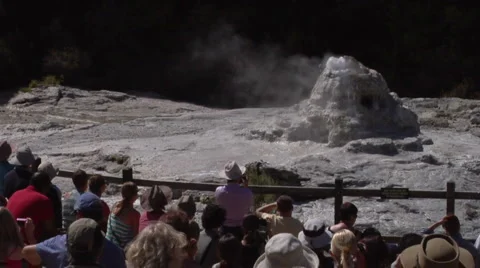 Medium shot, geyser beginning to erupt Stock Footage 2525194