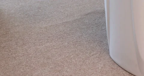 Medium shot gloves falling on the ground 動画素材 130671582