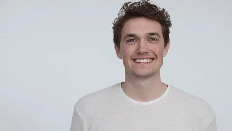 Medium Shot of Gorgeous Model in White Shirt and Background Smiling Video stock 116651184