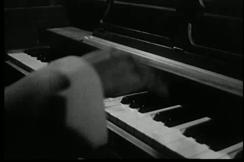 Medium shot of hands playing piano Stock Footage 11355544