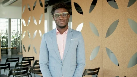 Medium shot of handsome bearded guy looking at camera Stock Footage 119979879