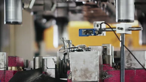 Medium shot of a hydraulic press making car parts in the production line, Stock Footage 255220184