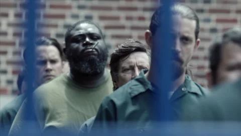 Medium shot of inmates in security checkpoint line,2000s, New-York, USA - Reenac Stock Footage 243734784