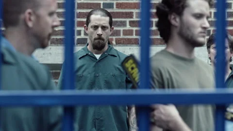 Medium shot of inmates in security checkpoint line, 2000s, New-York, USA - Reena Stock Footage 243735683