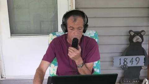 A Medium Shot of a Male Taking Part in a Podcast Stock Footage 155659752