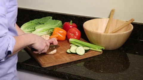 Medium shot of man cutting mushroom Stock Footage 61403524