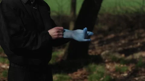 Medium shot of man preparing for environmental cleanup mission Stock Footage 333118472