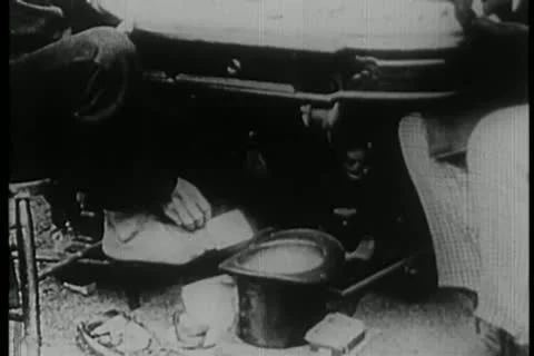 Medium shot of man putting card between toes Stock-Footage 11356241