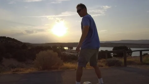 Medium Shot of Man Riding OneWheel Stock Footage 97651138