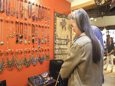 Medium shot of a man trying on a ring Stock Footage 76533804