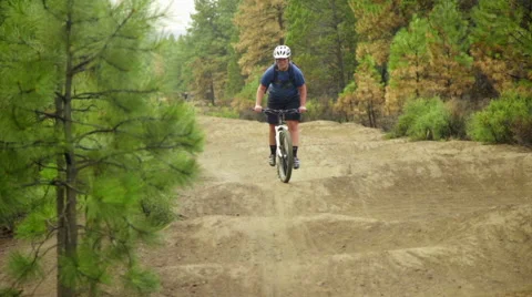 Medium shot of mountain biker Stock Footage 59538642