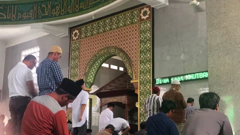 A medium shot of muslim peoples doing shalat and dua prayer Stock Footage 252886984