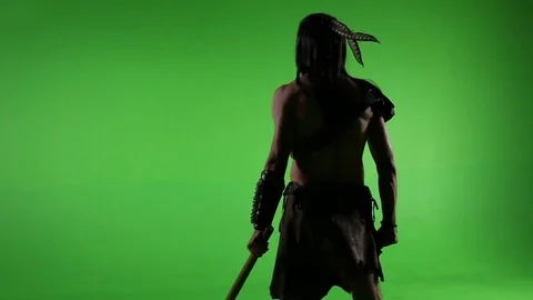 Medium shot of native from behind at night in front of green screen Stock Footage 81562931