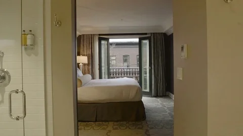 Medium shot of an old man walking in parallel bars 動画素材 73113779