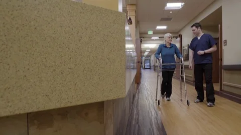 Medium shot of an old woman using a walker Stock-Footage 71824378