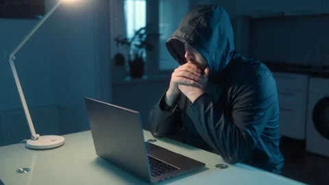 Medium Shot One Hacker In Hoodie Typing Then Thinking At Laptop Stock Footage 333270684