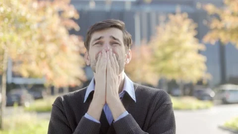 Medium shot of one man praying with hope, cinematic style, autumn park. Stock Footage 331820093