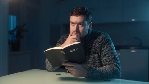 Medium Shot One Man Reading Bible Thinking Deeply Alone At Night Stock Footage 333270803