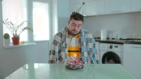 Medium Shot One Tired Man Sleeping Near Lit Birthday Cake Indoors 库存影片 334042800