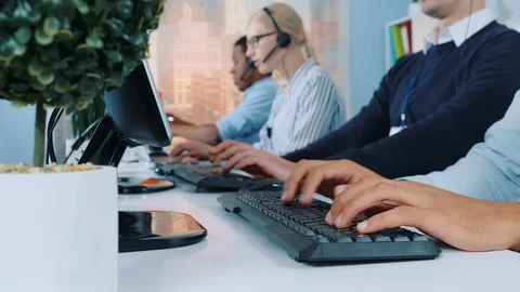 Medium shot of operators hands typing on keyboard in modern office Stock Footage 124252475