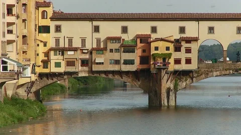 Medium shot pan across the Ponte Vecchio Florence, Italy Stock Footage 74796272