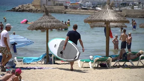 Medium shot people at the beach Stock Footage 128349216