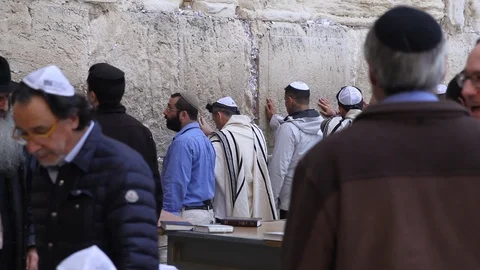 Medium Shot of People Praying in Western Wall, Jerusalem Stock Footage