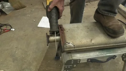 Medium Shot of a Person Using a Reciprocating Saw 스톡 동영상 154813119