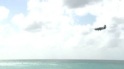 Medium Shot of a Plane Flying Above the Sea and Beach 스톡 동영상 33466787