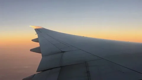 Medium shot of plane wing in the air Stock Footage 160809113