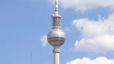 Medium shot pushes in on the Berlin TV Tower with clouds in background Stock-Footage 282559932