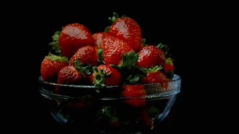 Medium Shot Rotating Bowl of Strawberries Stock Footage