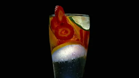 MEDIUM SHOT ROTATING STRAWBERRY LEMON LIME SODAWATER 動画素材 93972869